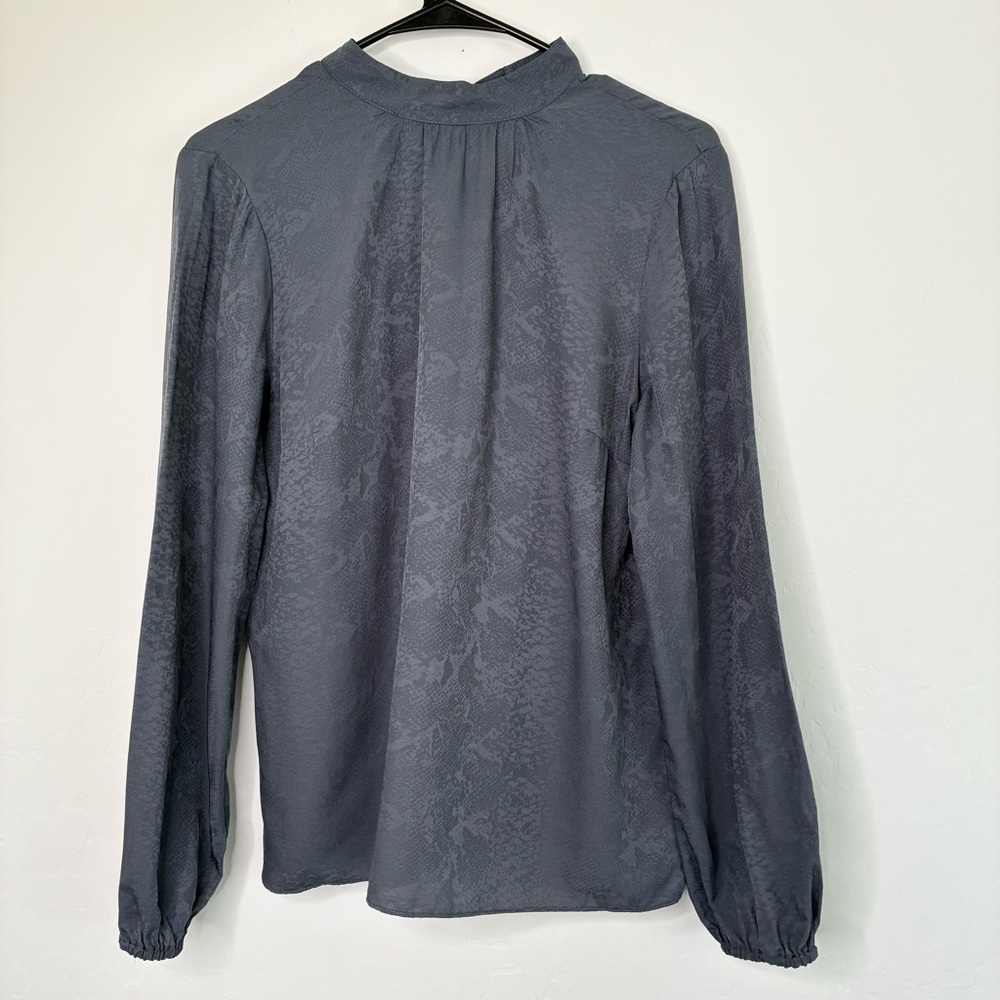 Downeast high neck blouse. Tie neck back